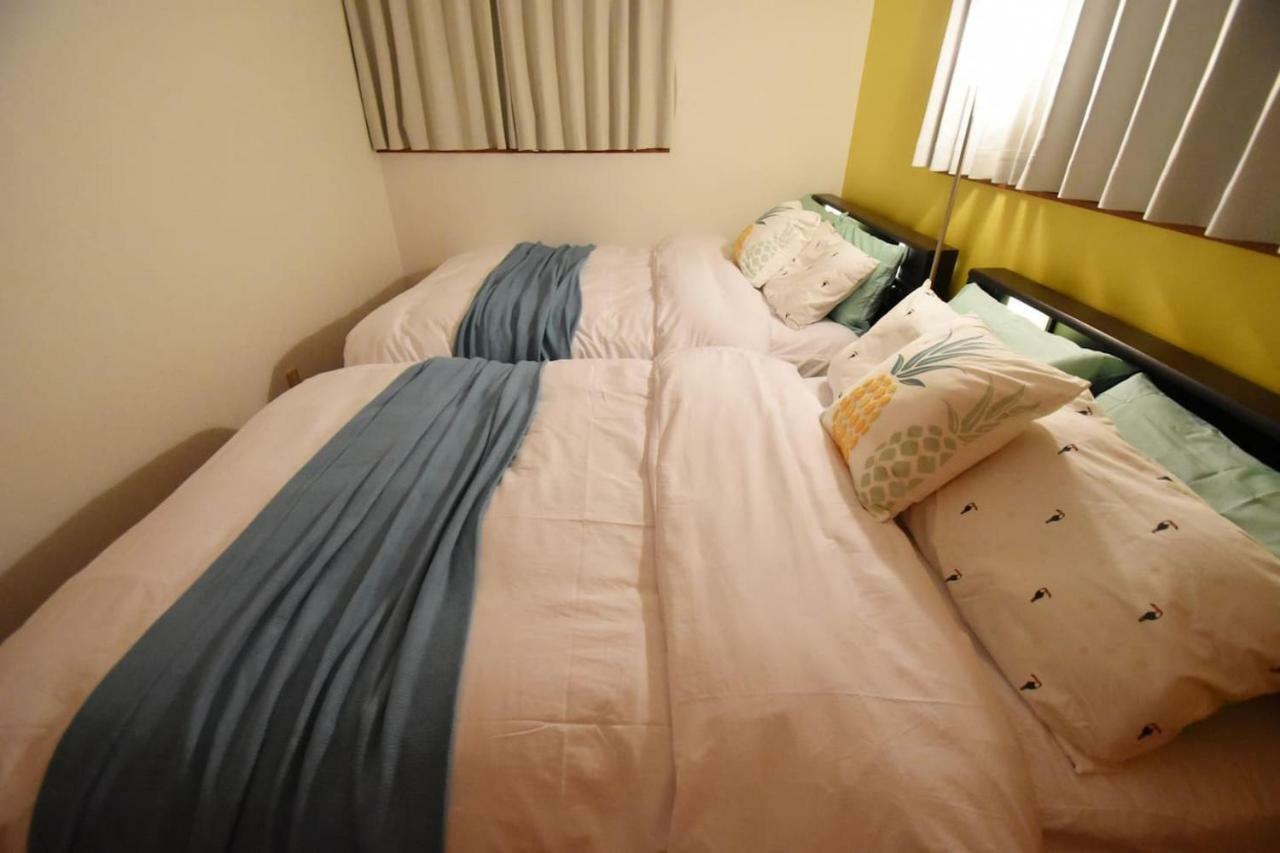 Guest House Tsukishiro Nanjo Bagian luar foto