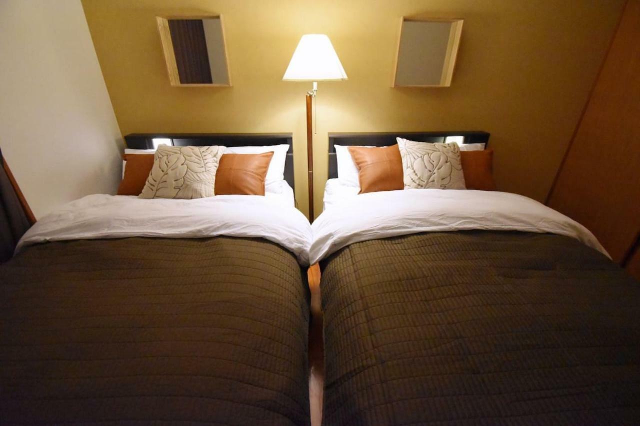 Guest House Tsukishiro Nanjo Bagian luar foto