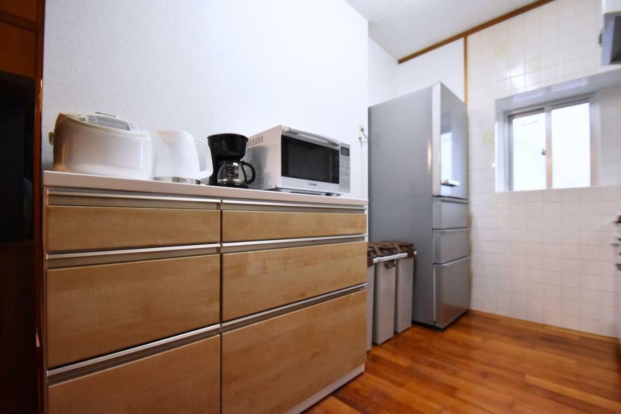 Guest House Tsukishiro Nanjo Bagian luar foto