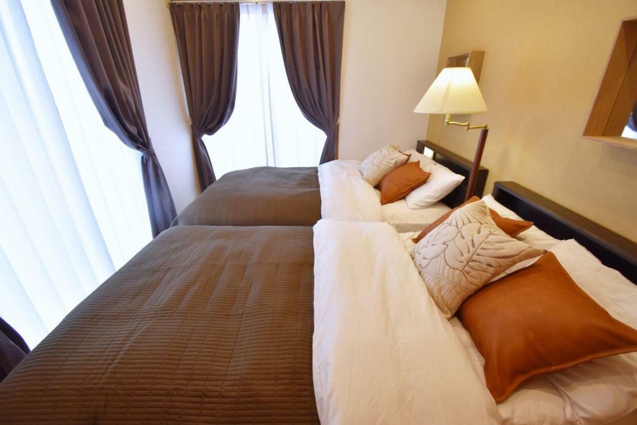 Guest House Tsukishiro Nanjo Bagian luar foto