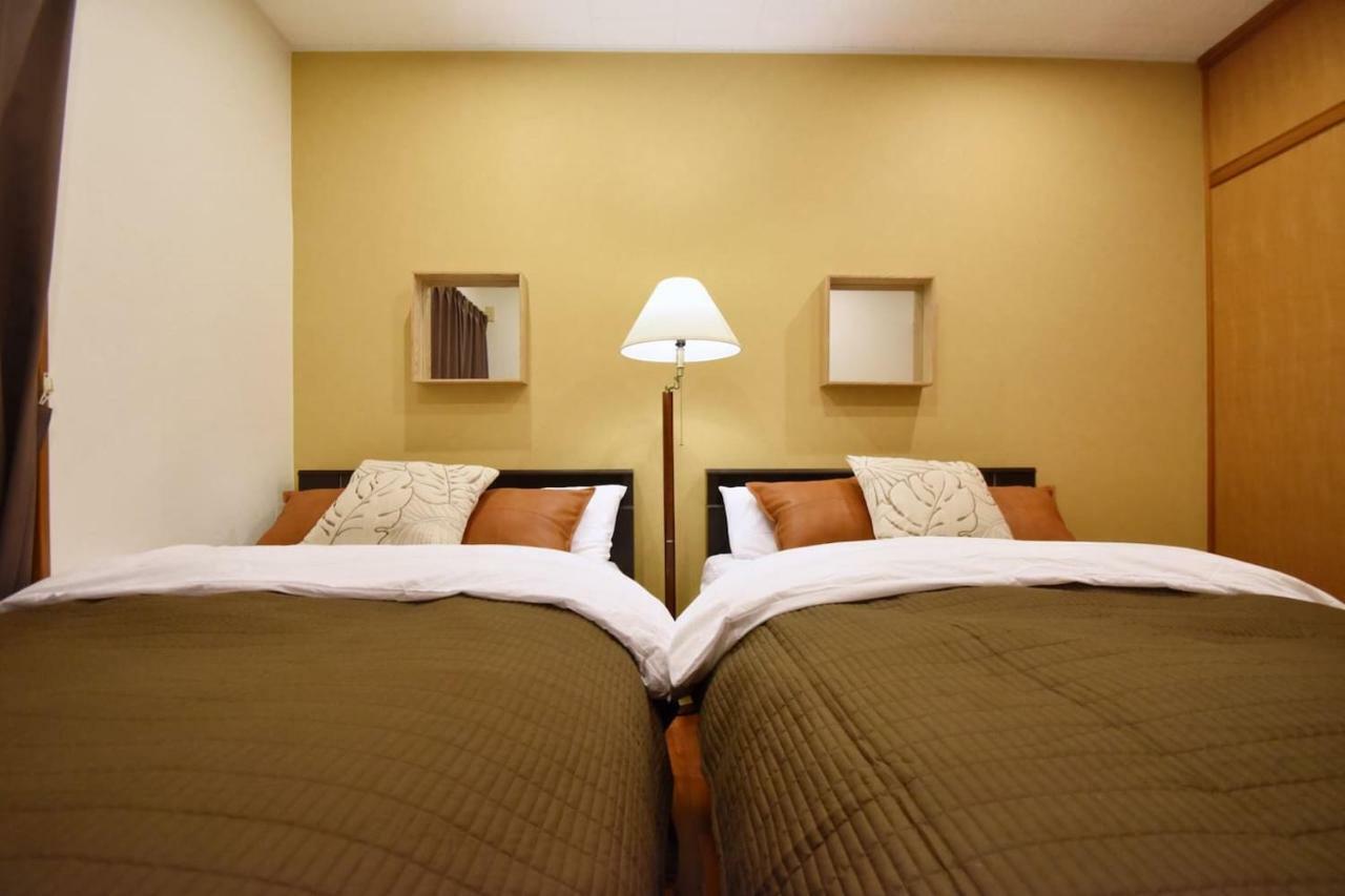Guest House Tsukishiro Nanjo Bagian luar foto