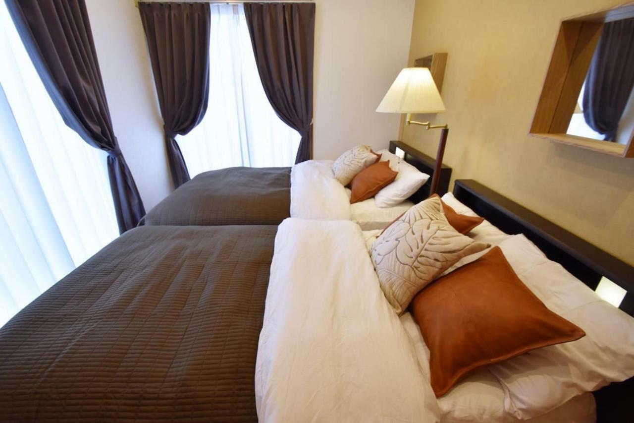 Guest House Tsukishiro Nanjo Bagian luar foto