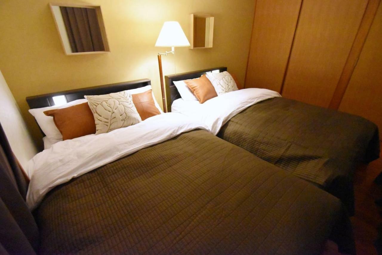 Guest House Tsukishiro Nanjo Bagian luar foto