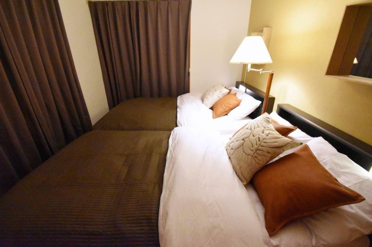 Guest House Tsukishiro Nanjo Bagian luar foto